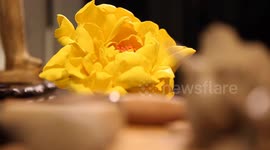 Hong Kong ceramicist breathes life into floral sculptures