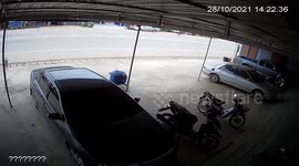 Shocking moment motorcycle rider crashes on boy riding bicycle