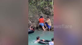 Swimmers panic as snake slithers through water at beauty spot
