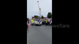 Mourning fans line streets during Sinead O'Connor's funeral procession in Bray