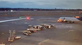 Tow truck crashes into passenger plane at Seattle airport