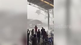 Rainstorm interrupts lessons as it batters school in Thailand