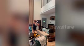 Heartwarming moment daughter makes surprise return visit to parents
