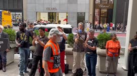 People Read Indictment at Trump Indictment Rapid Response in New York, USA