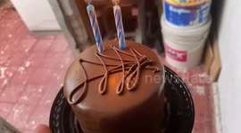 Boy Kicks Birthday Cake