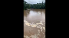 The flood water rose two meters, making the area isolated and people had to move to the roof to avoid the flood
