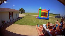 Kid's birthday ruined as wind blows bouncy castle into the air