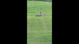 Woman riding toy jeep with nephew comes crashing down the slope *Hilarious Fail*