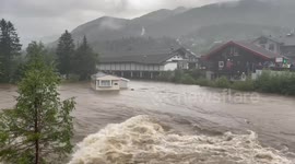 Dramatic moment mobile home crashes into bridge was floods cause havoc in Norway
