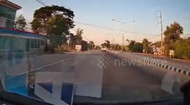 Pickup truck turning across lanes cuts off oncoming car