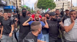 Palestinian mourners carry body of man killed by Israeli forces in West Bank