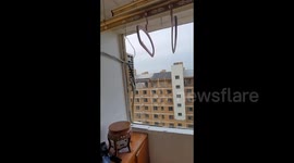A Man Finds his Windows Missing in the Morning After Strong Winds and Heavy Rains in Baoding, Hebei, China