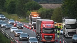 Plane crash lands on dual carriageway