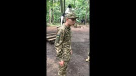 Soldiers in Ukraine take moment to play with adorable kitten