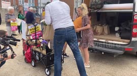 People Collect Welcome Packs for Refugees on Bibby Stockholm in Dorset, UK