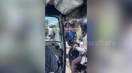 Clothes rack left on road outside home causes traffic jam