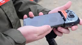 Driving a digger with a mobile phone