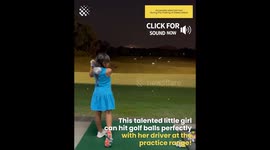 Little Girl Smashes Golf Balls at Driving Range