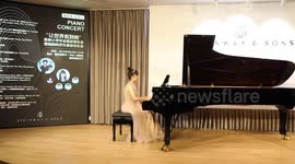 Vision-impaired girl knocking on her piano dream
