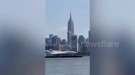 Concorde plane moved by barge for restoration in Brooklyn, New York