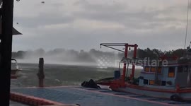 Waterspout tornado capsizes BOAT leaving two passengers missing and six injured in Thailand