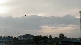Freak tornado capsizes BOAT leaving two passengers missing and six injured in Thailand