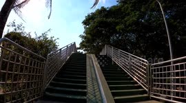 POV footage shows walking along mile-long 'Green Bridge' that connects two parks in Thailand