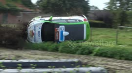 Dramatic crash sees car flip over and spin on its side during rally race in Belgium