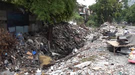 Huge piles of rubbish along railway spark outrage in Bangkok, Thailand