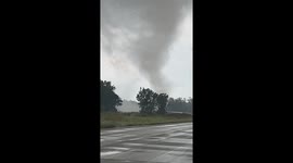 Watching A Funnel Cloud Form From the Highway