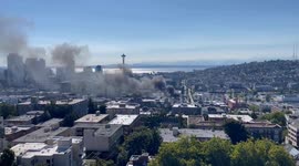Man arrested after huge flames erupt out of Seattle encampment