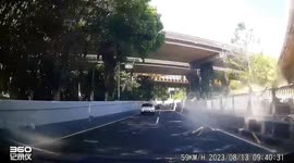 Scooter riders miraculously survive as bridge timber rains down in China