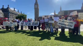The Afghanistan and Central Asian Association holding a peaceful protest in Parliament Square to mark two years since the Taliban takeover.