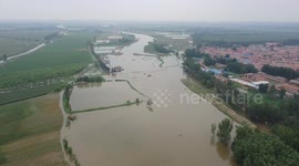 Flood-affected regions in N China step up efforts to restore normalcy