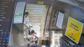 Girl zooms to top floor alone as door malfunction locks out mother in China