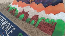 Sand Student Artists Created 77th Independence Day Red Fort with a tricolour backdrop & also features an ISRO rocket and shows India's national flag proudly gracing the Moon