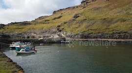 Boscastle Fisherman leaving the Harbour a few hours before high water.