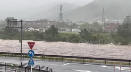 Japan: Rivers Swell As Typhoon Lan Brings Torrential Rain 6