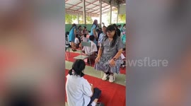 Single Thai father dresses up as woman for adopted daughter on Mother’s Day