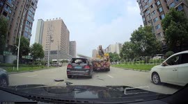 Chinese driver walks away unharmed after Mercedes SUV impaled by electrical poles in collision