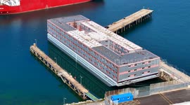 The Bibby Stockholm migrant barge at Portland Port in Dorset remains unoccupied while undergoing cleansing to remove Legionella bacteria from the water system.