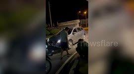 Kind driver gives broken-down motorcycle rider a push home