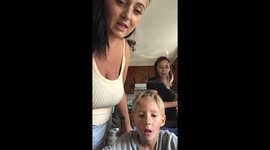 Mom Cracks an Egg on Son's Head