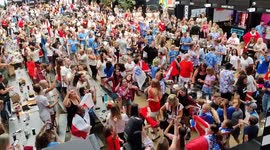 England fans at Boxpark Wembley celebrate victory over Australia in the semi-final of the Women's World Cup