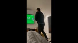 Aussie football superfan loses his mind after his favorite team turns things around to win the game