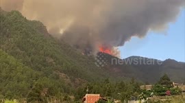 Wildfire forces evacuations, road closures on Spanish island