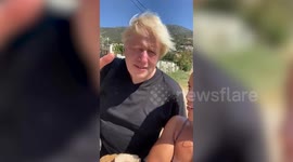 Boris Johnson spotted lounging around in swim trunks on Greek Island