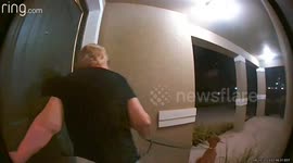Elderly woman screams in fear as huge BEAR lunges at her dog while on her doorstep