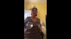 Fun Grandma wraps wine glasses on her forehead and chest to make a tune *Fun Video*