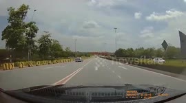 Horror moment private jet explodes in fireball when it crashes on road in Malaysia